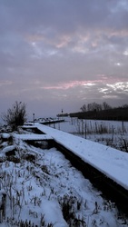 Téli naplemente a csónakkikötőből