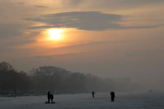 Párás naplemente a jégről fotózva